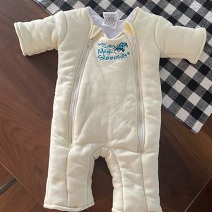 Merlin magic sleep suit; size small 3-6 months NEW